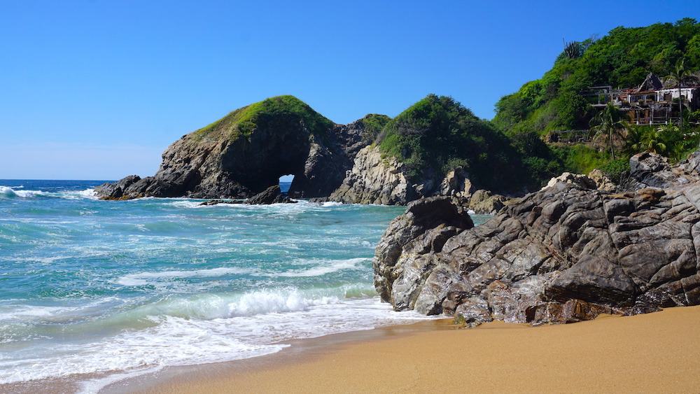 Beautiful cove in Playa Zipolite in Oaxaca, Mexico