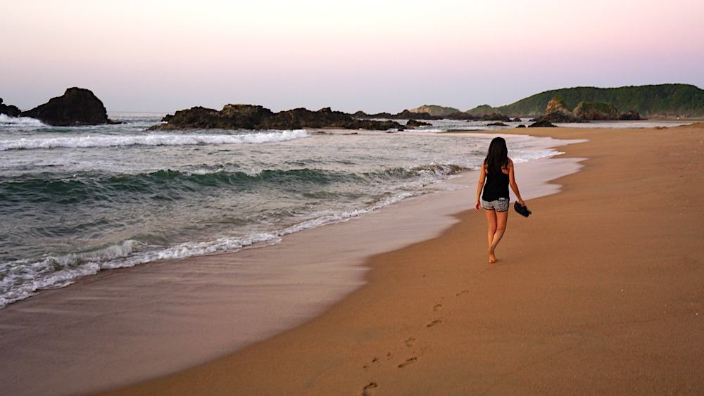 Kristina from Off Path Travels on the beach near San Agustinillo near Mazunte and Playa Zipolite in Oaxaca, Mexico