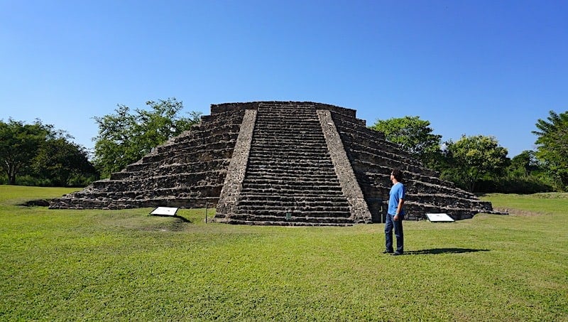 Michael standing in front of one of the melting pyramids at Lagartero archelogical ruins in Chiapas, Mexico.