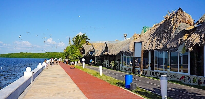 The line of palapas on the water at Paradores de Cockteleros in Campeche Mexico