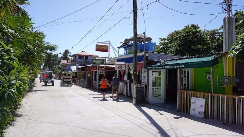 A street with golf carts in Caye Caulker