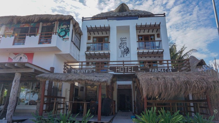 The front of a hotel on the boardwalk in Mahahaul Mexico