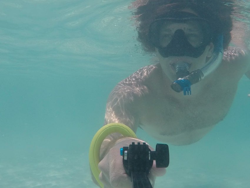 Michael snorkeling in Placencia, Belize