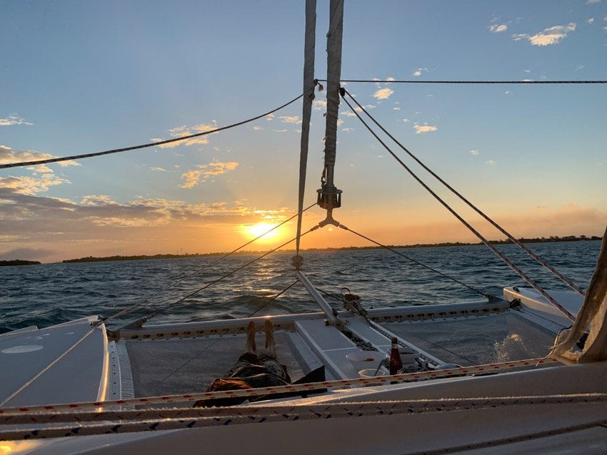 The sunset on the way from Moho Caye to Placencia