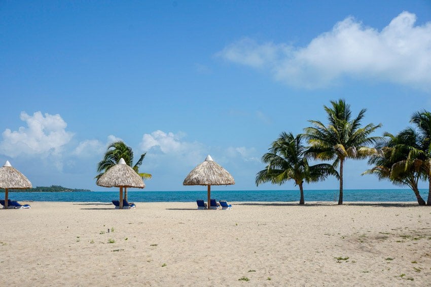 The beach and lounge area at Brisa Oceana Resort in Placencia, Belize