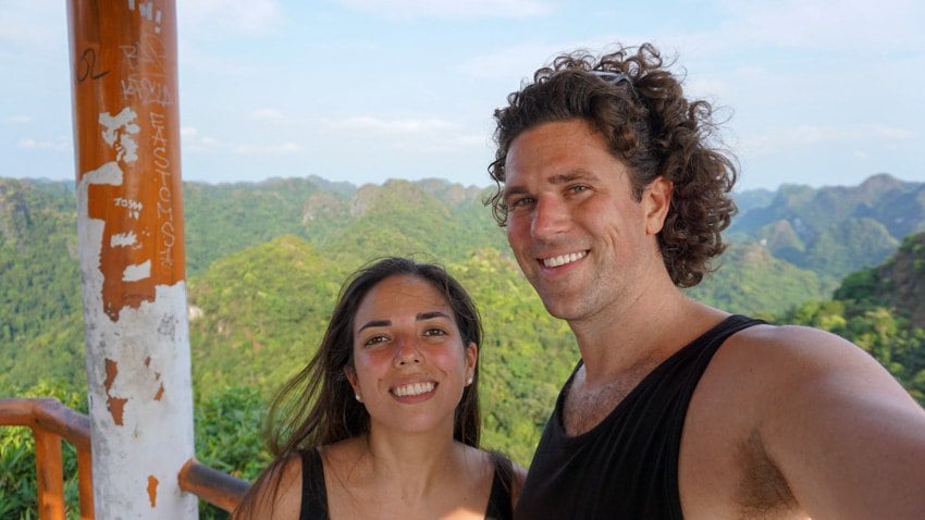 Kristina and Michael hot and sweaty after hiking up to the lookout hut in Cat Ba National Park