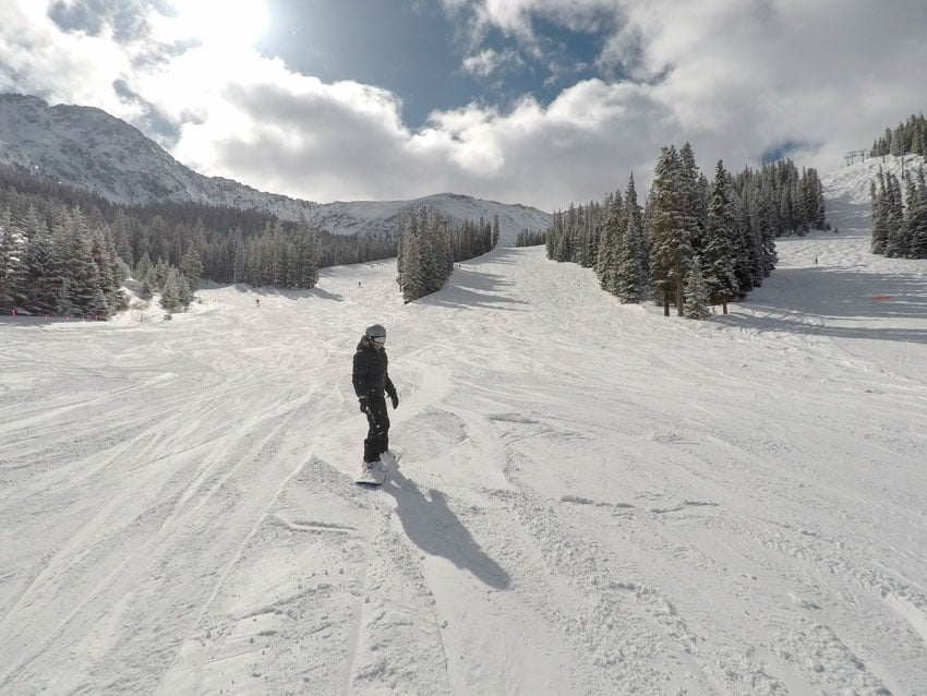 Kristina snowboarding in Colorado