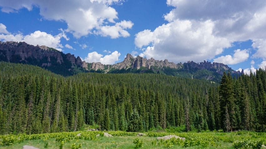 A photo of the San Juan Mountains in southwestern Colorado, one of our must-have stops on your road trip itinerary