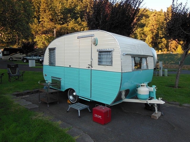 A small, tow-bhind recreational vehicle