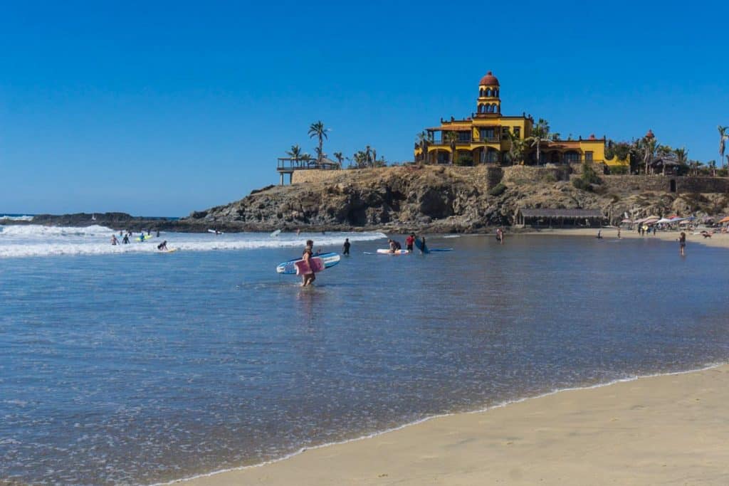 People learning to surf at Cerritos Beach