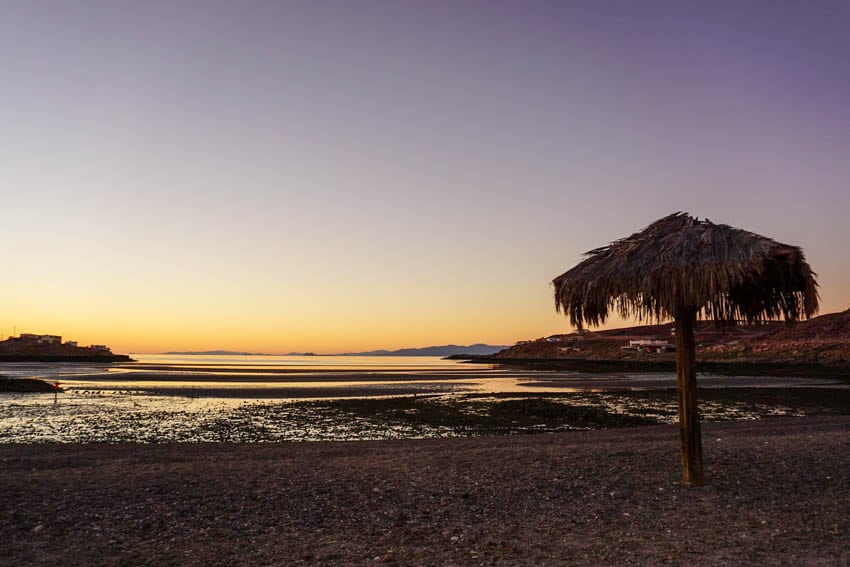 sunset and palapa at Puertecitos beach