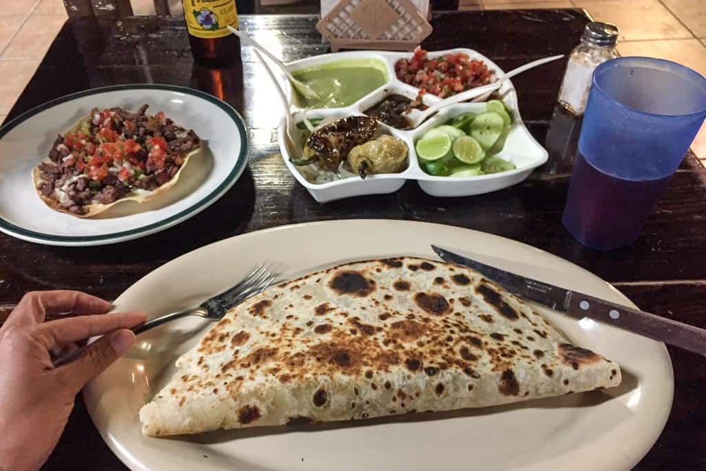 Quesadilla and toppings at a Loreto restaurant