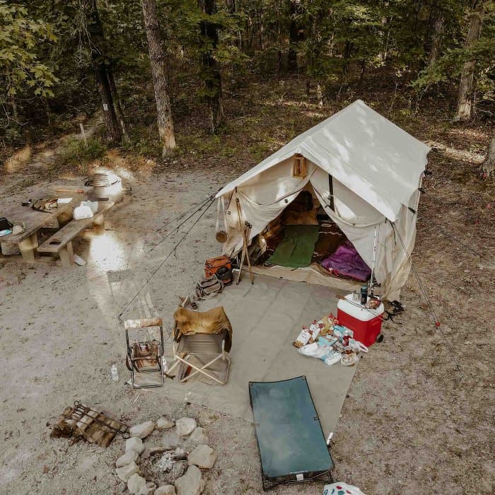 The WhiteDuck Alpha Canvas Wall Tent from above while used camping in the woods
